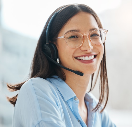Friendly help desk representative smiling